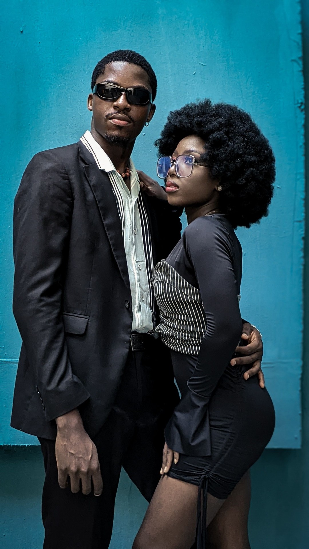 A couple wearing bespoke rings, designed just for them